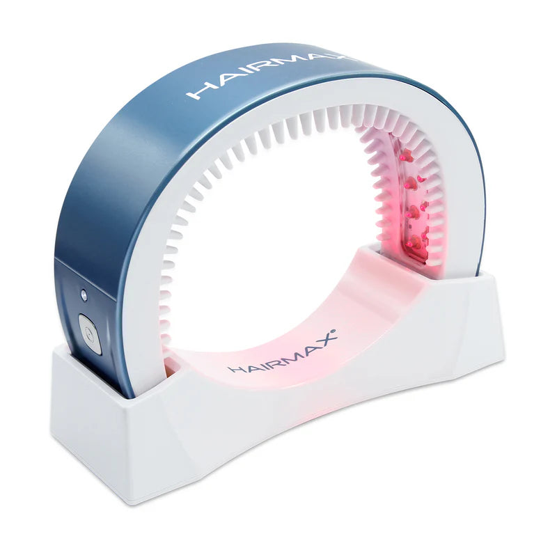 Hairmax device with blue and white design on a white background