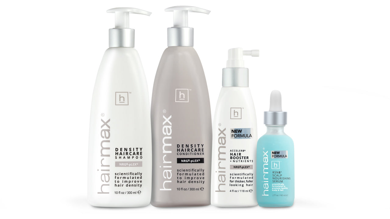 Collection of Hairmax hair care products on a white background