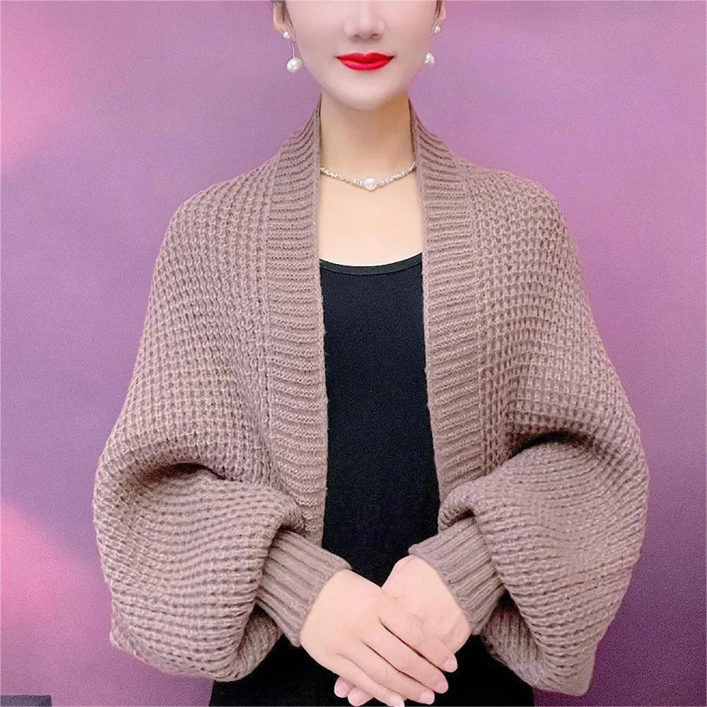 Modern coat with hollowed-out knitted scarf