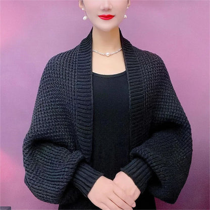 Modern coat with hollowed-out knitted scarf