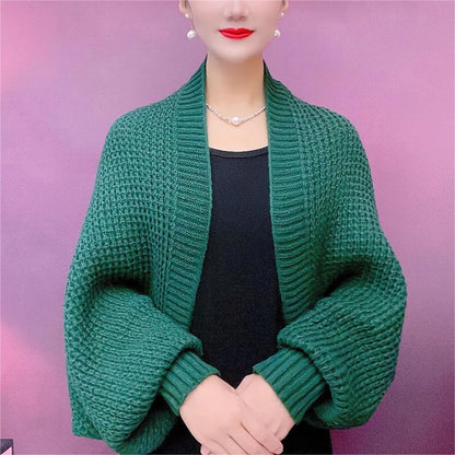 Modern coat with hollowed-out knitted scarf